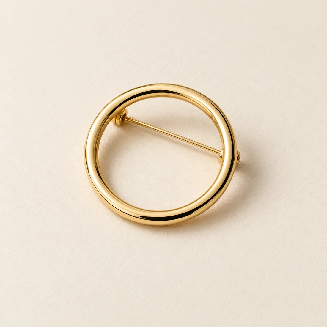 Orbit Outline Brooch, gold, geometric openwork design