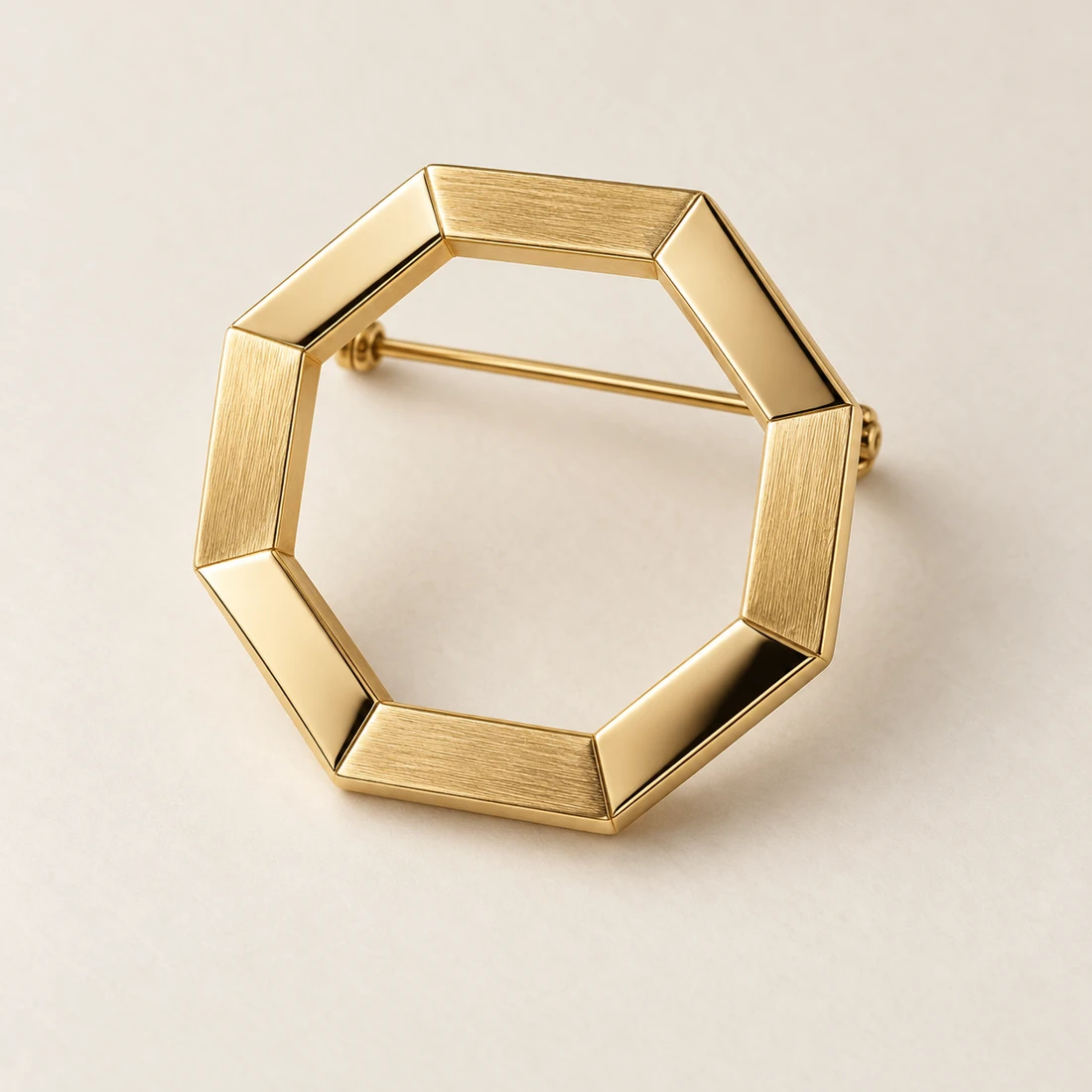Axis Octagon Brooch, gold, geometric openwork design